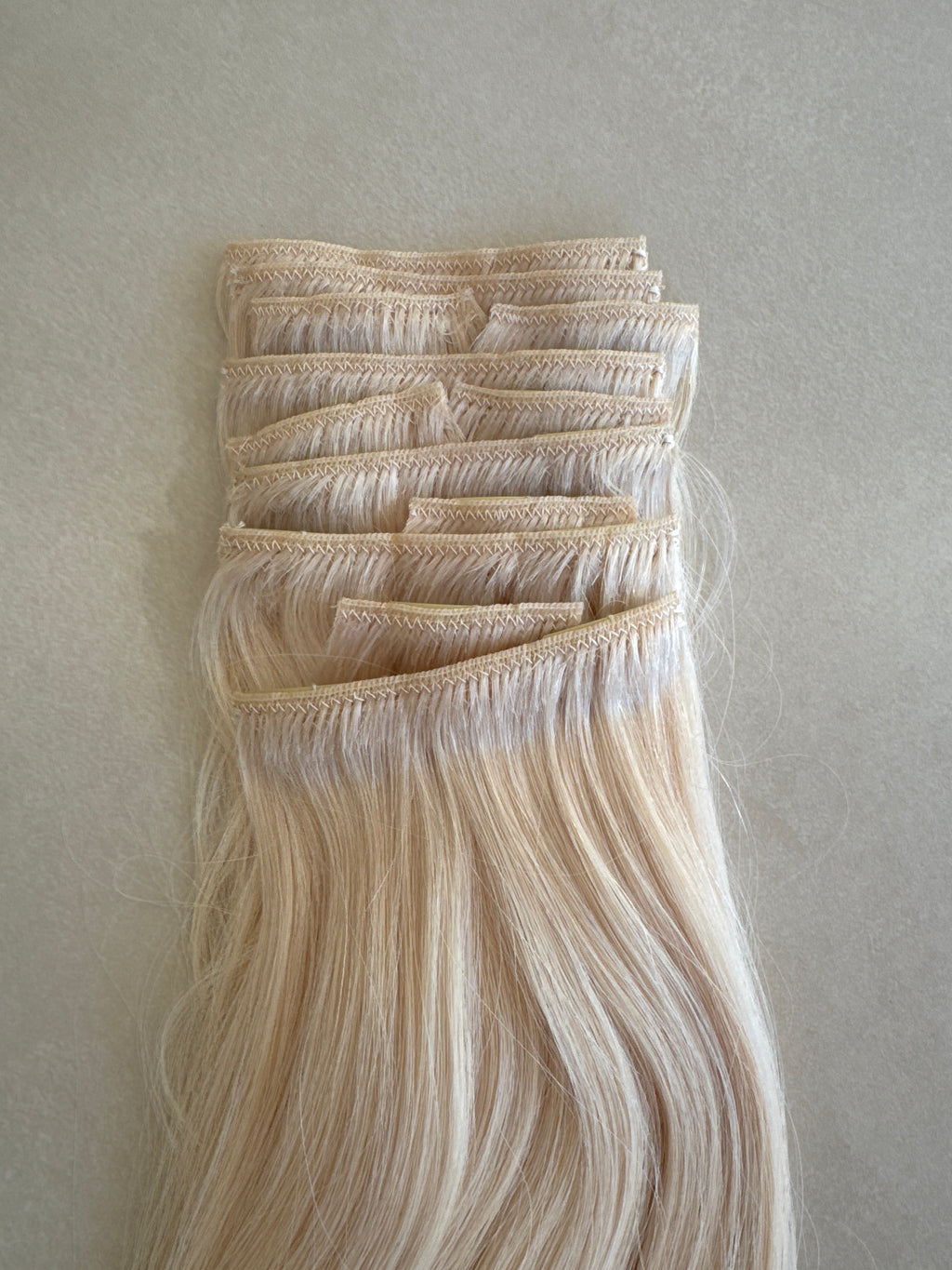 High-end 100% real human hair, with no acid processing. Sourced from original braided hair, it’s completely different from the typical clip-in products on the market. Most standard products last up to about two months, while ours can be used for over a ye